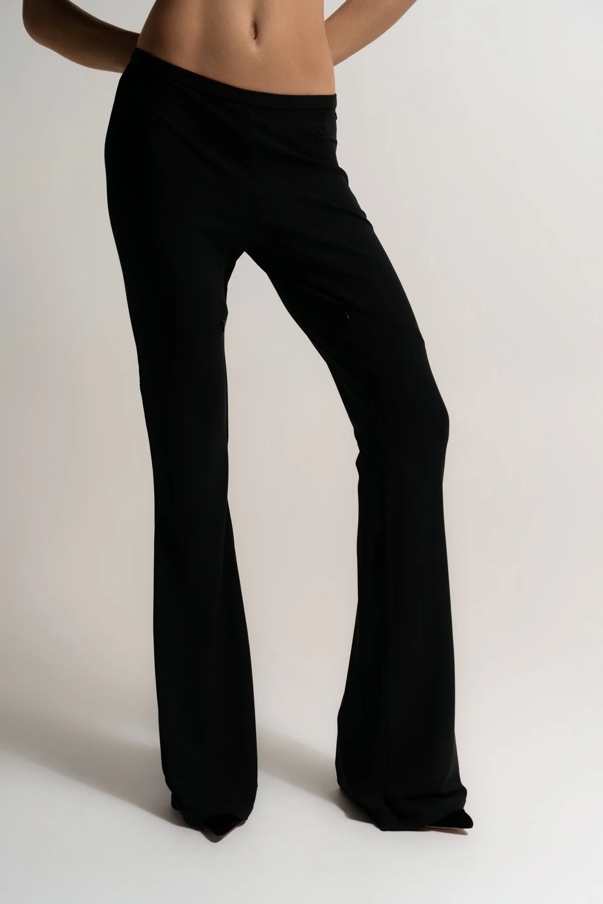 COURRGES | ELLIPSE ZIPPED CREPE JERSEY BOOTCUT PANTS